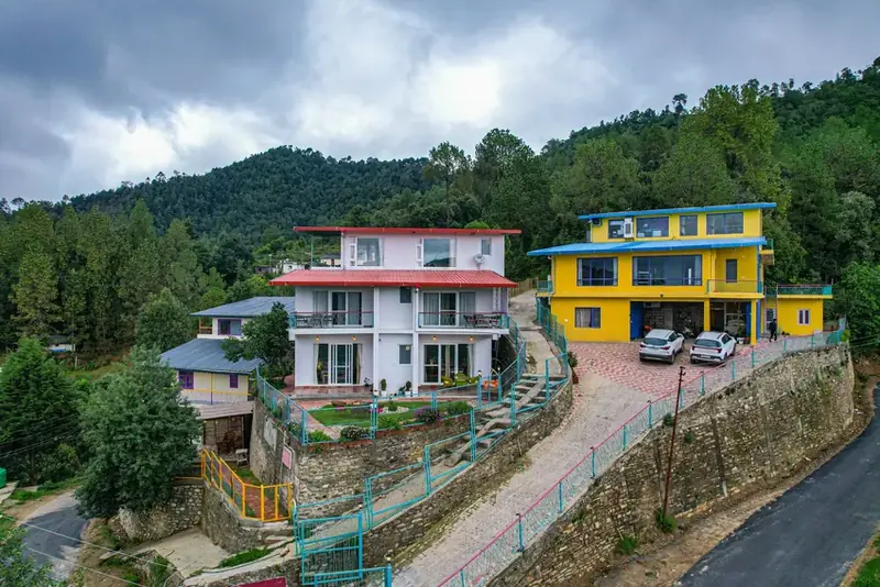 Hillside luxury resort property with cottages and pine forest at Adrushya Estates, Mukteshwar